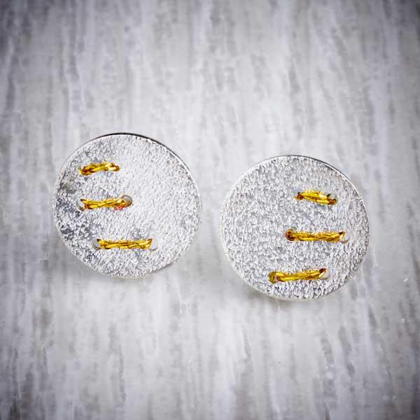 Silver Studs with 3 Gold Thread Stitches by Sara Bukumunhe. Image property of THE JEWELLERY MAKERS.-0