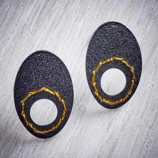 Oxidised (Blackened) Silver Cut-out circle earrings sewn with Gold thread by Sara Bukumunhe-0