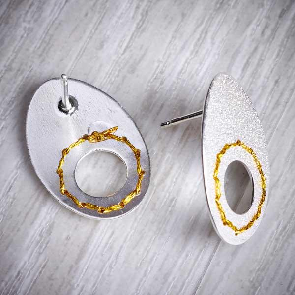 Silver Cut-out circle earrings sewn with Gold thread by Sara Bukumunhe (SUEH)-1
